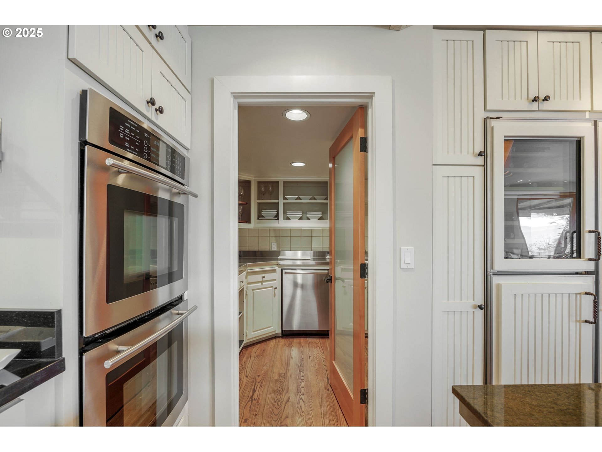 1630 Northwest Olmar Drive Grants Pass, OR 97526 - Photo 13 of 42 a kitchen with stainless steel appliances granite countertop a refrigerator and a stove