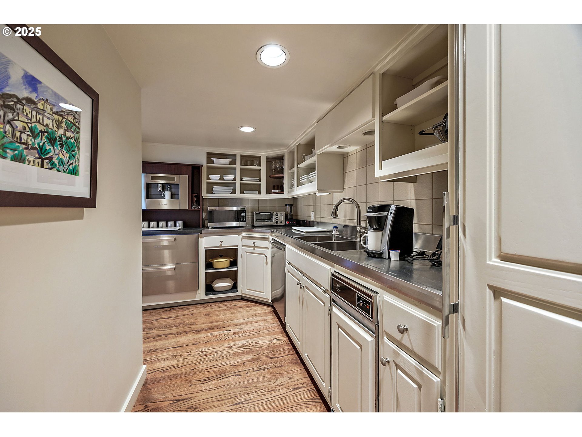1630 Northwest Olmar Drive Grants Pass, OR 97526 - Photo 14 of 42 a kitchen with stainless steel appliances granite countertop a stove top oven a sink and dishwasher