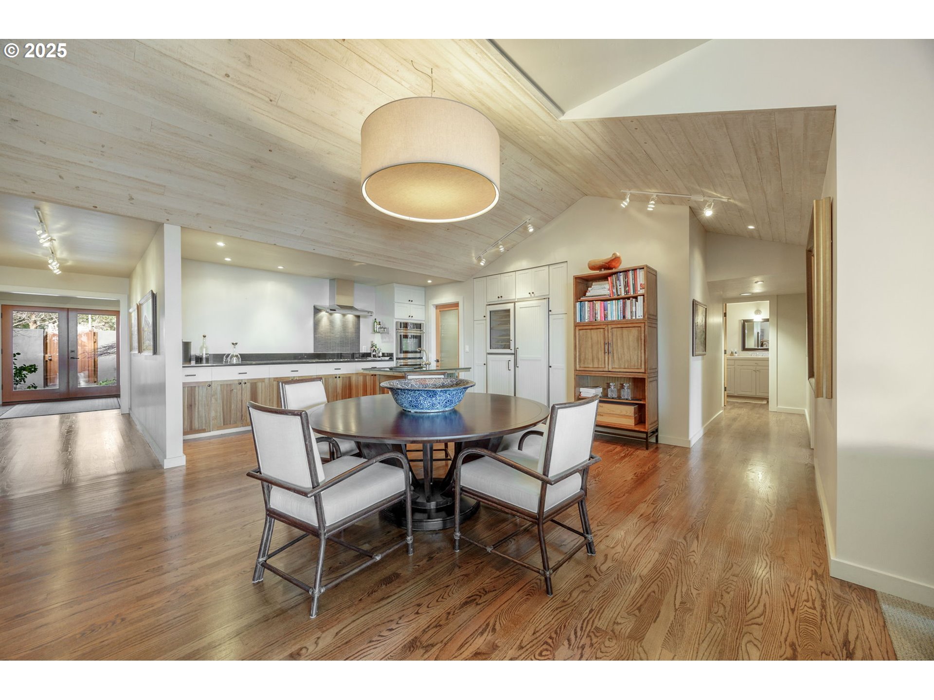 1630 Northwest Olmar Drive Grants Pass, OR 97526 - Photo 17 of 42 a dining room with furniture and wooden floor