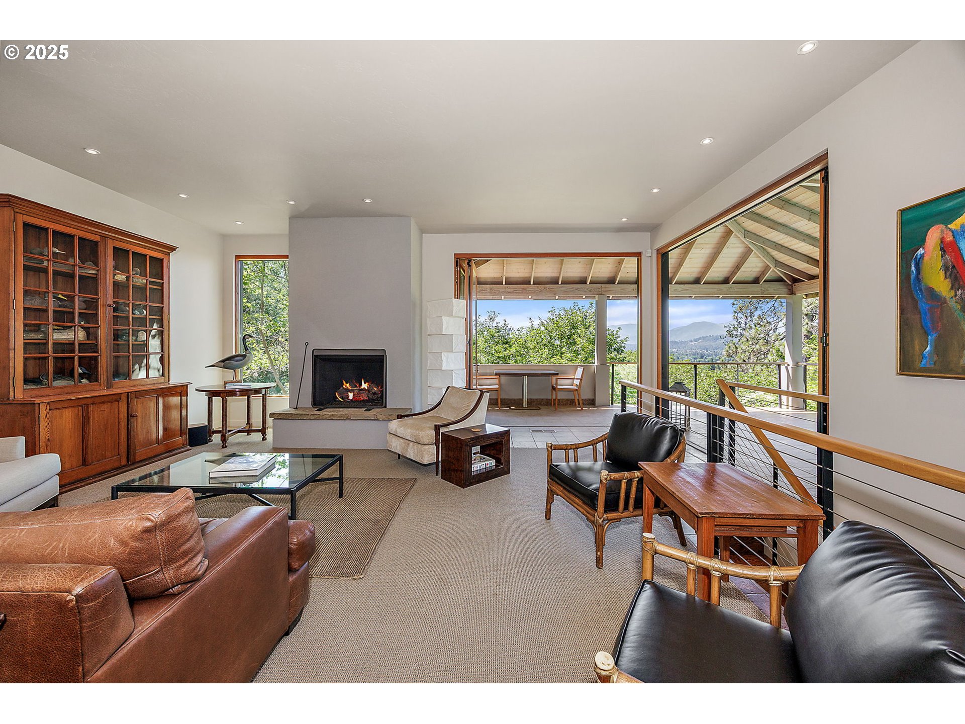 1630 Northwest Olmar Drive Grants Pass, OR 97526 - Photo 18 of 42 a living room with furniture and a fireplace