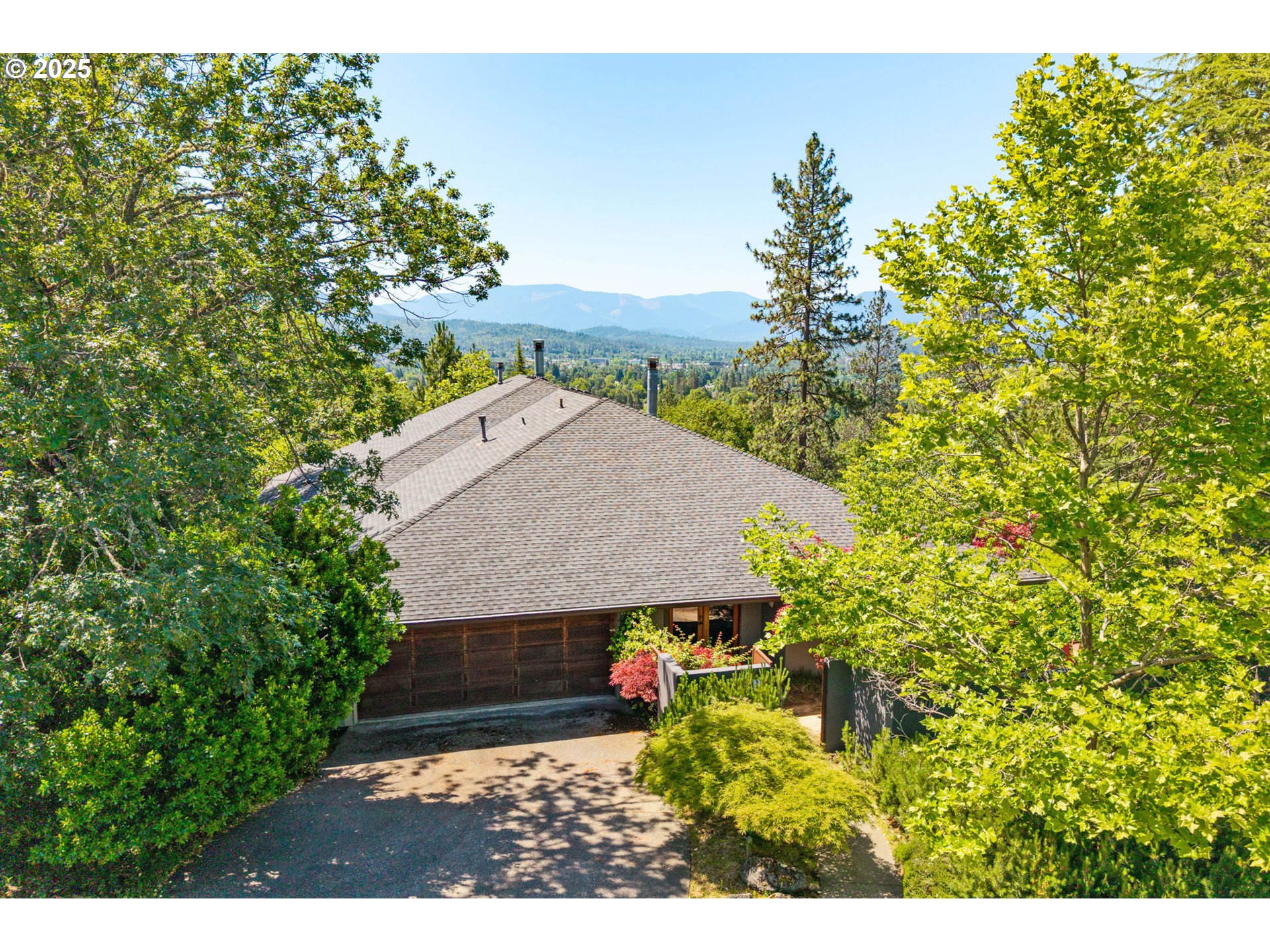 1630 Northwest Olmar Drive Grants Pass, OR 97526 - Photo 26 of 42 an aerial view of a house with a yard