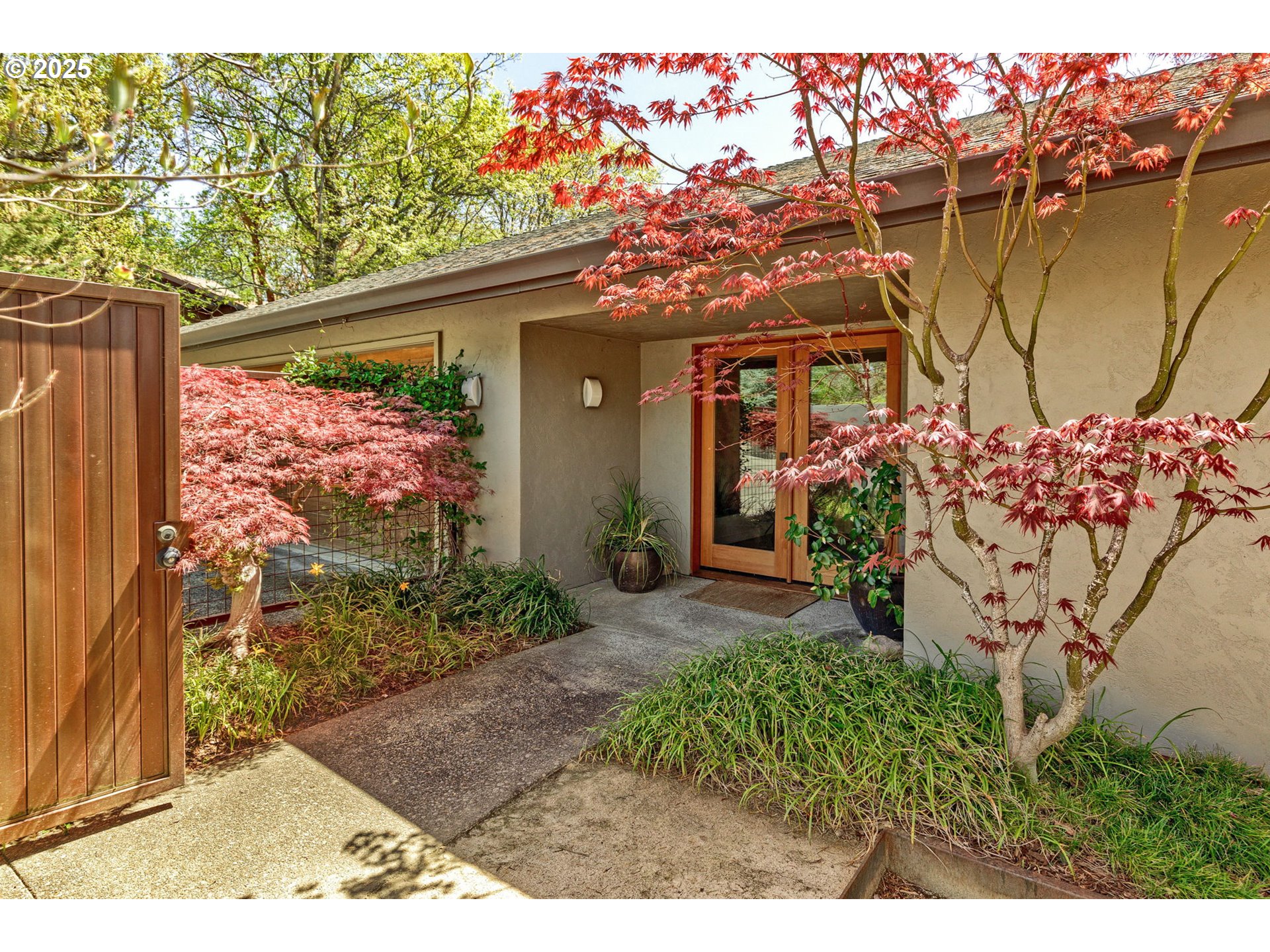 1630 Northwest Olmar Drive Grants Pass, OR 97526 - Photo 29 of 42 a front view of a house with garden