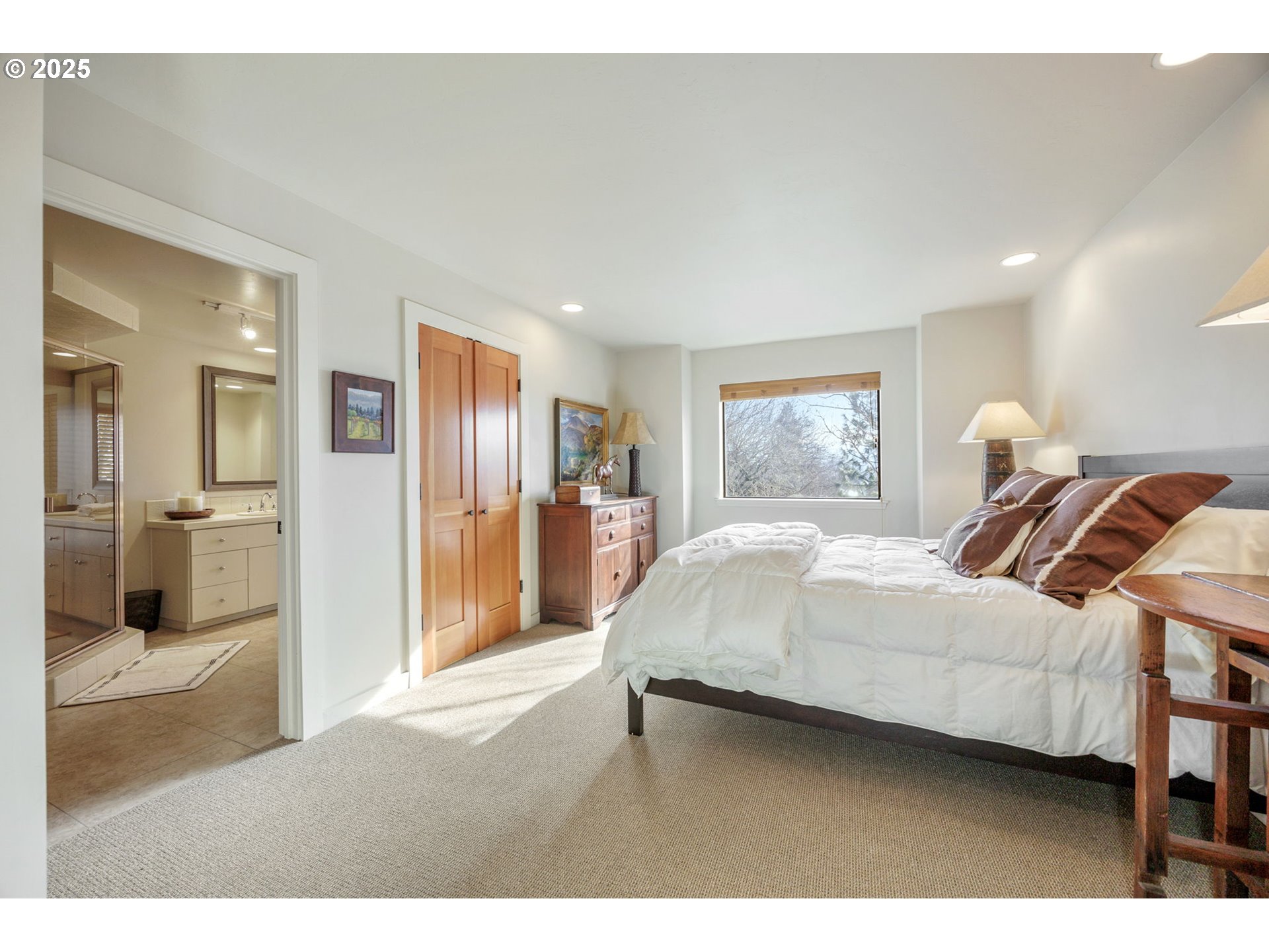 1630 Northwest Olmar Drive Grants Pass, OR 97526 - Photo 39 of 42 a bedroom with a large bed and a view of bedroom