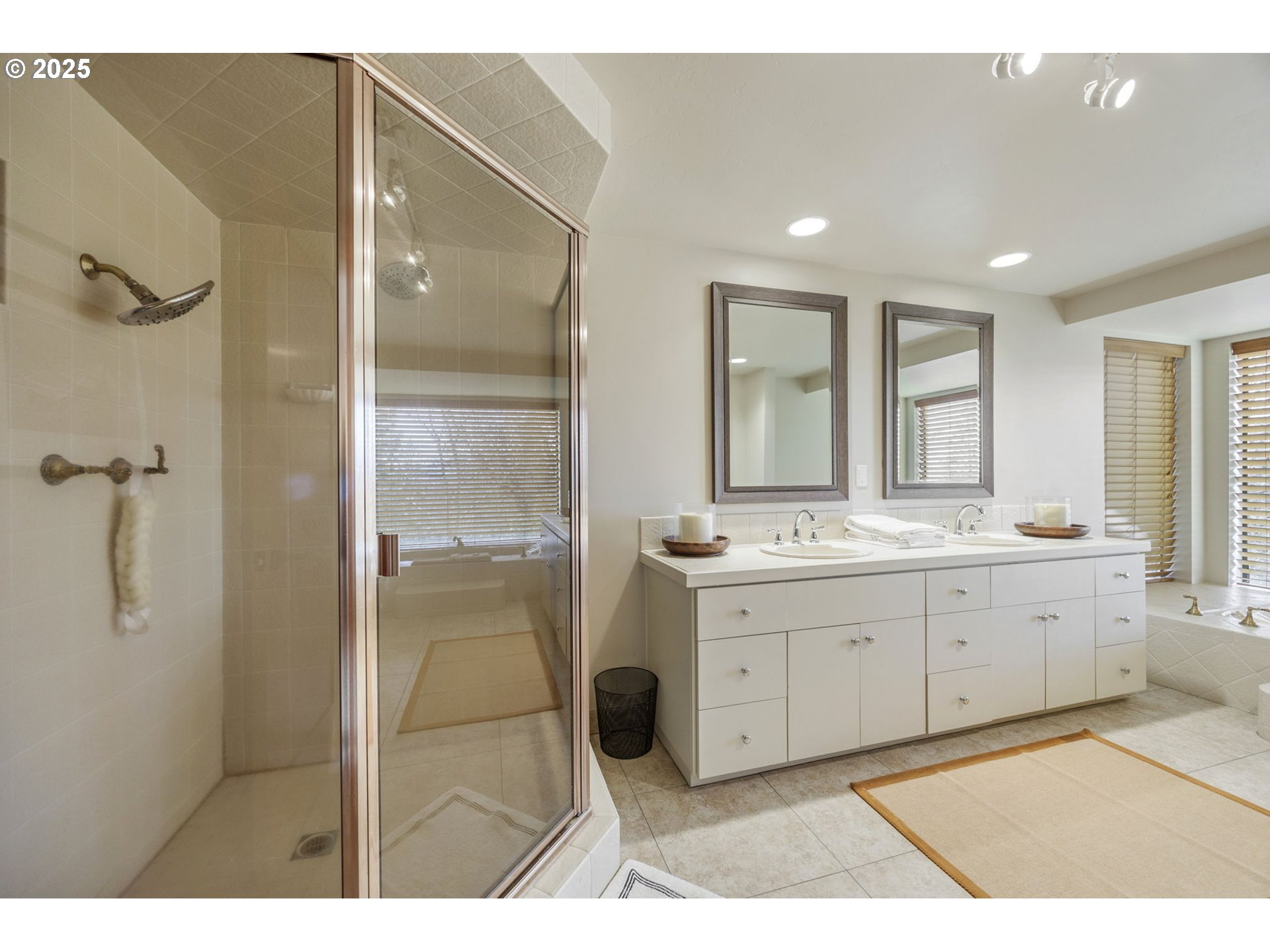 1630 Northwest Olmar Drive Grants Pass, OR 97526 - Photo 40 of 42 a bathroom with a granite countertop sink a large mirror and a bathtub
