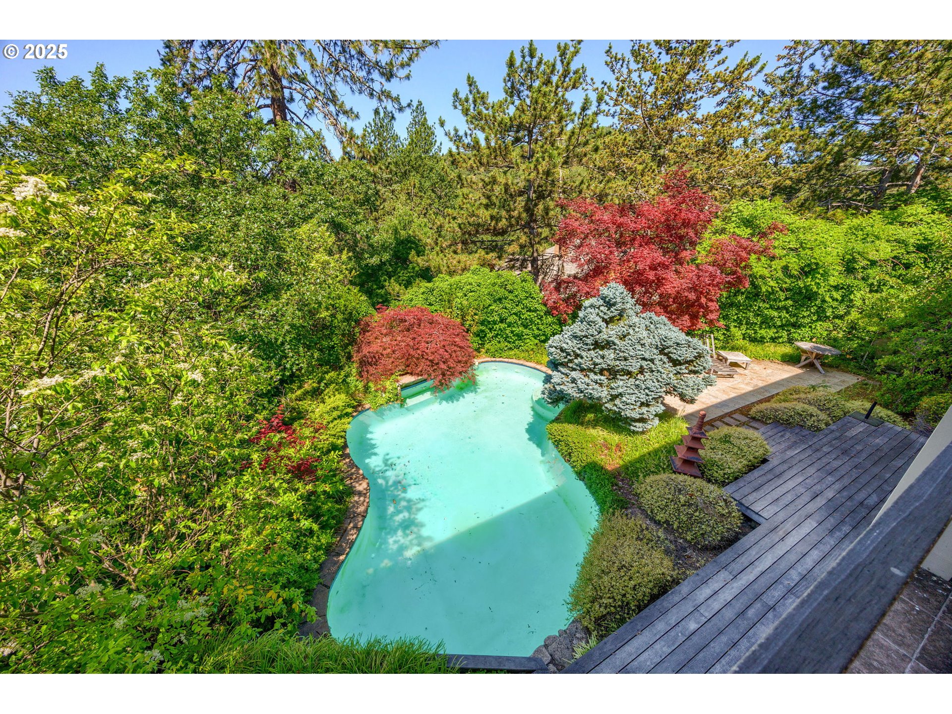 1630 Northwest Olmar Drive Grants Pass, OR 97526 - Photo 4 of 42 a view of a wooden fence