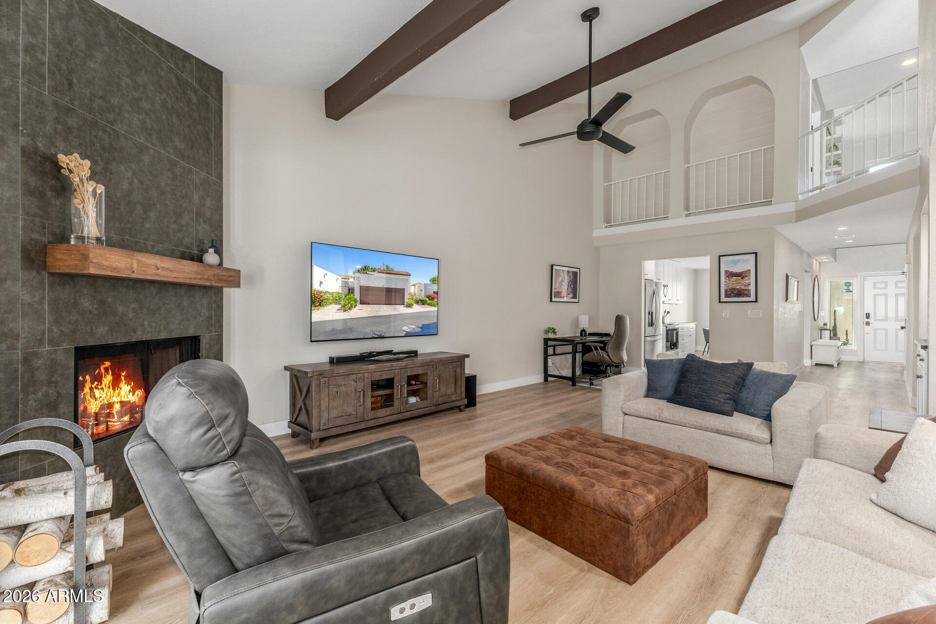 11629 North 40th Way Phoenix, AZ 85028 - Photo 11 of 47 a living room with furniture and a fireplace