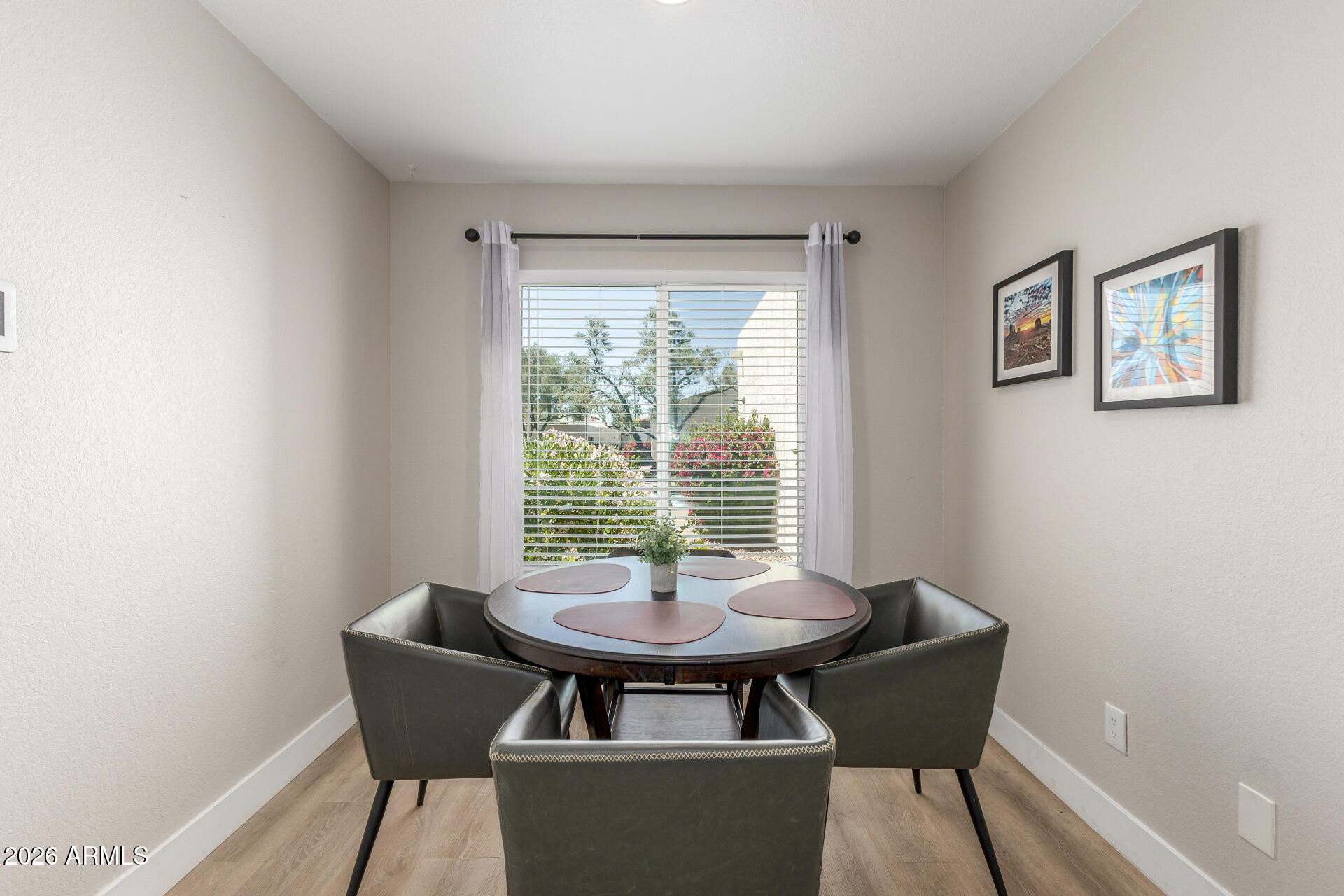 11629 North 40th Way Phoenix, AZ 85028 - Photo 18 of 47 a view of a dining room with furniture and window