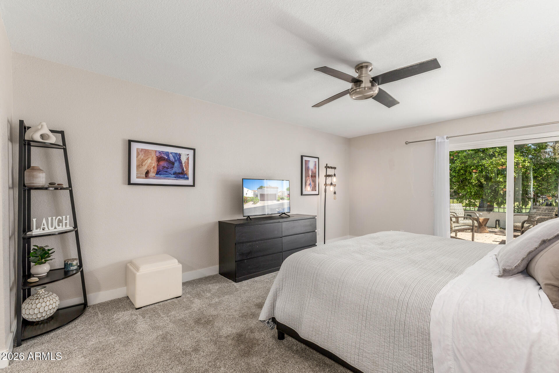 11629 North 40th Way Phoenix, AZ 85028 - Photo 19 of 47 a bedroom with a bed and a window