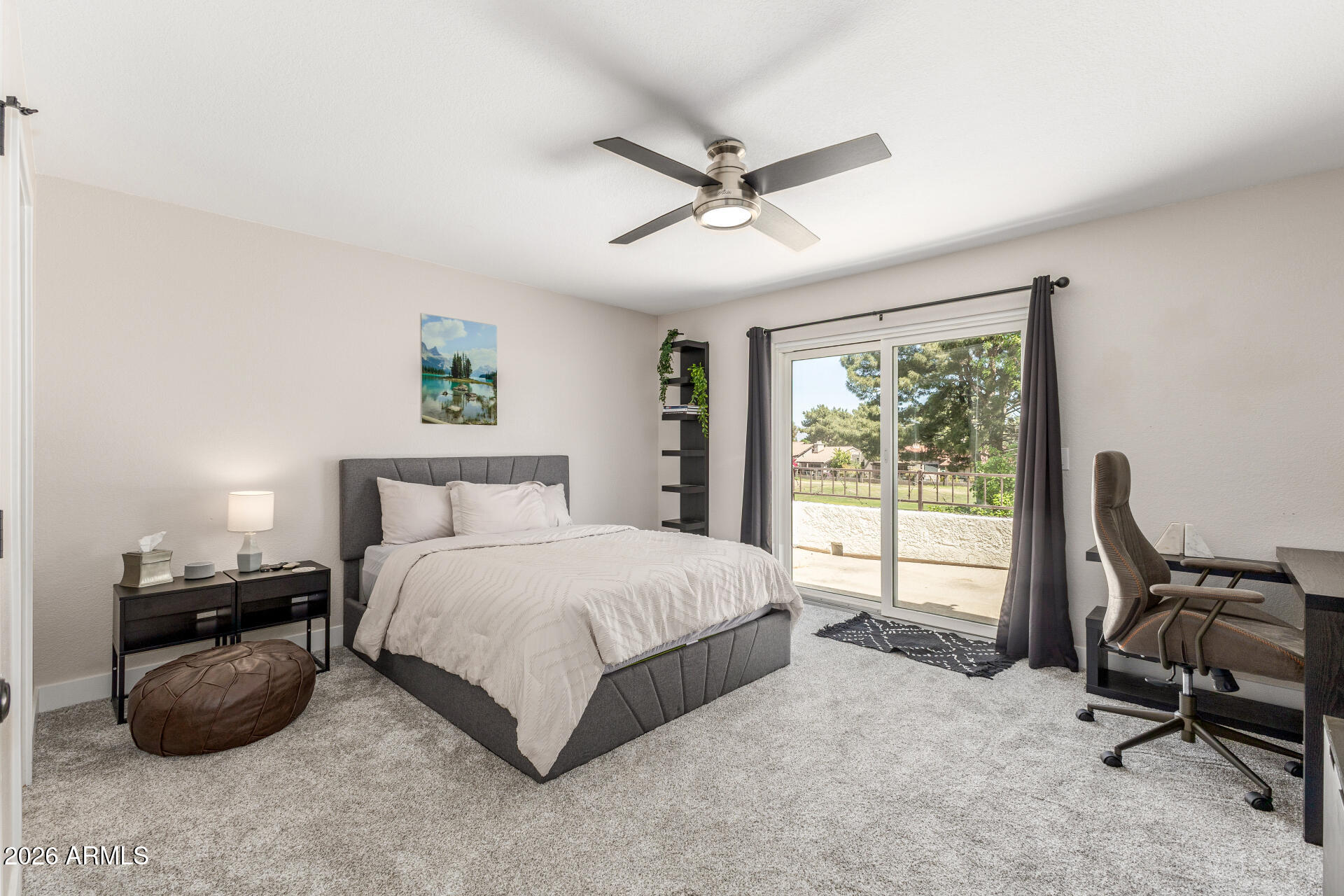 11629 North 40th Way Phoenix, AZ 85028 - Photo 29 of 47 a bedroom with a bed a desk and chair with window