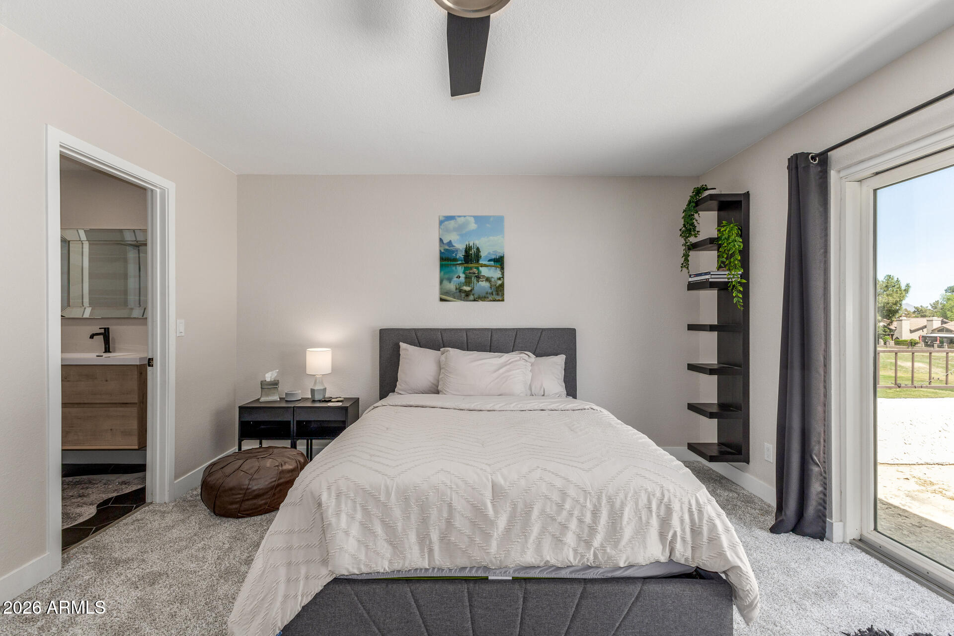 11629 North 40th Way Phoenix, AZ 85028 - Photo 31 of 47 a bedroom with a bed and a window