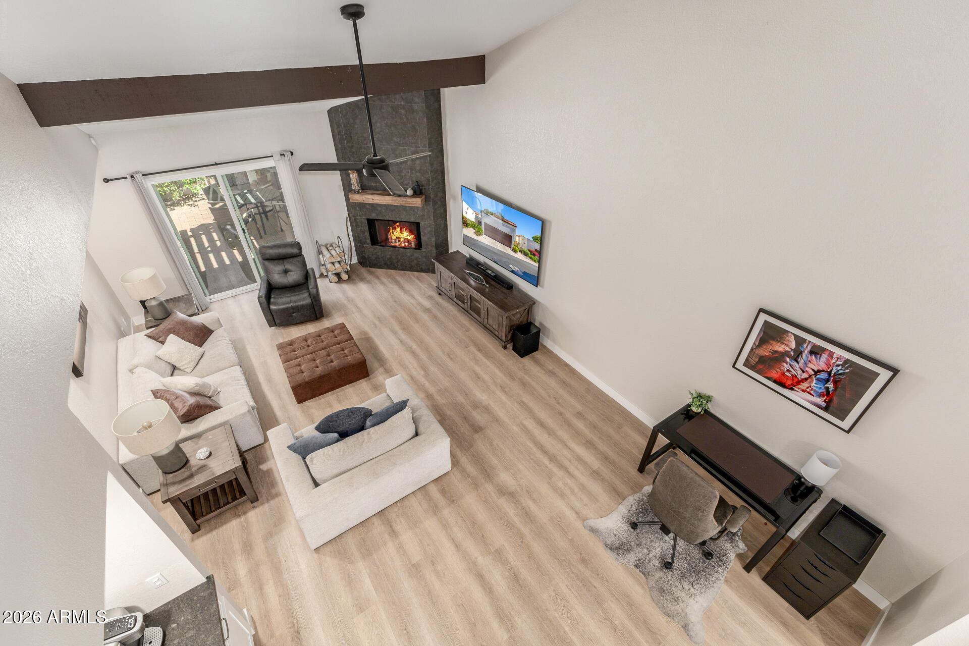 11629 North 40th Way Phoenix, AZ 85028 - Photo 35 of 47 a living room with furniture and a flat screen tv