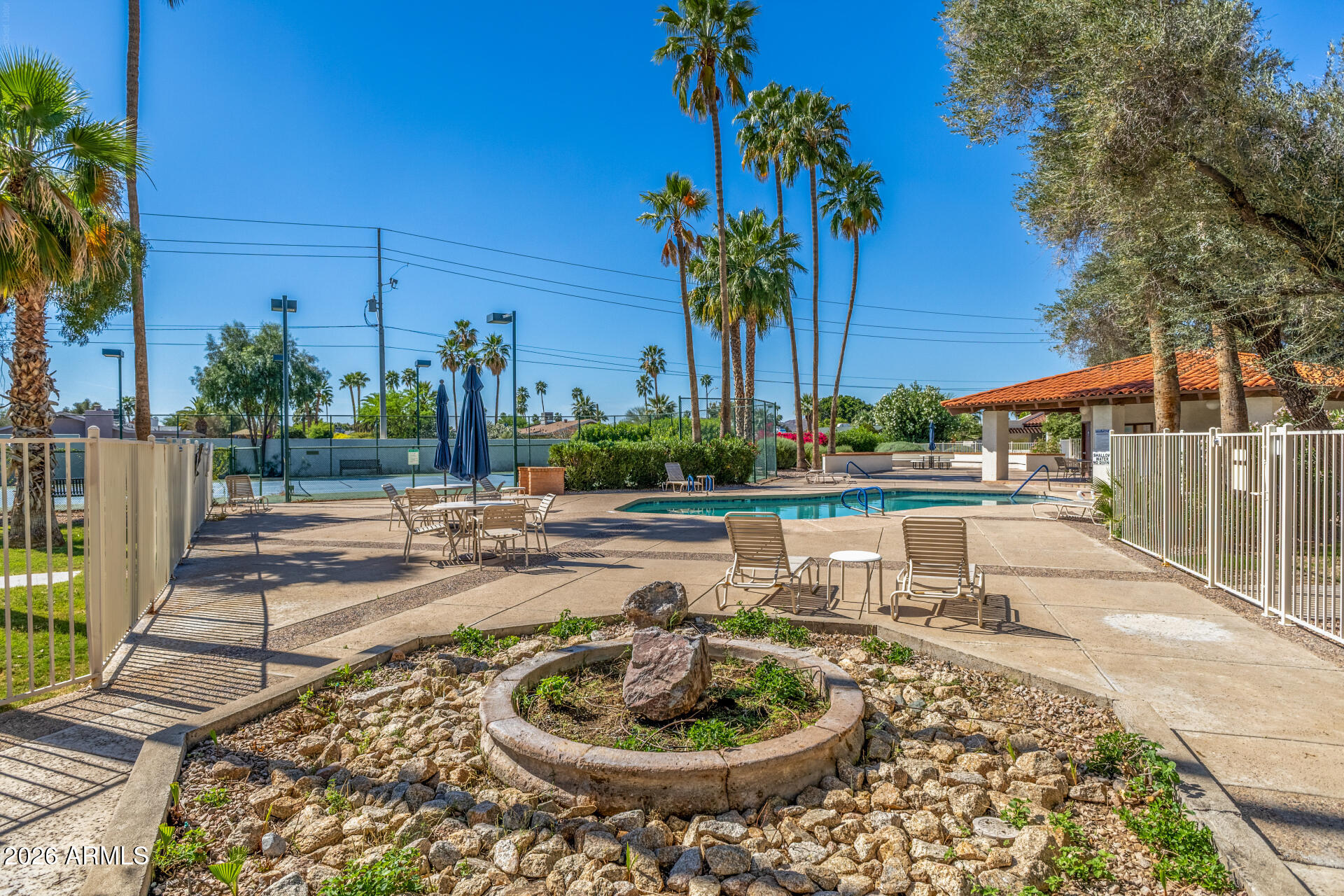 11629 North 40th Way Phoenix, AZ 85028 - Photo 45 of 47 a swimming pool with outdoor seating and yard