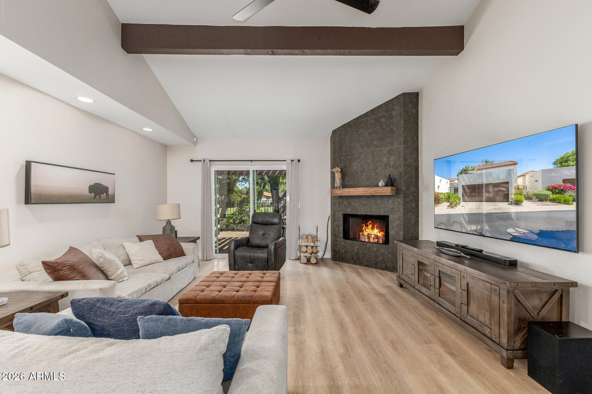 11629 North 40th Way Phoenix, AZ 85028 - Photo 8 of 47 a living room with furniture and a fireplace