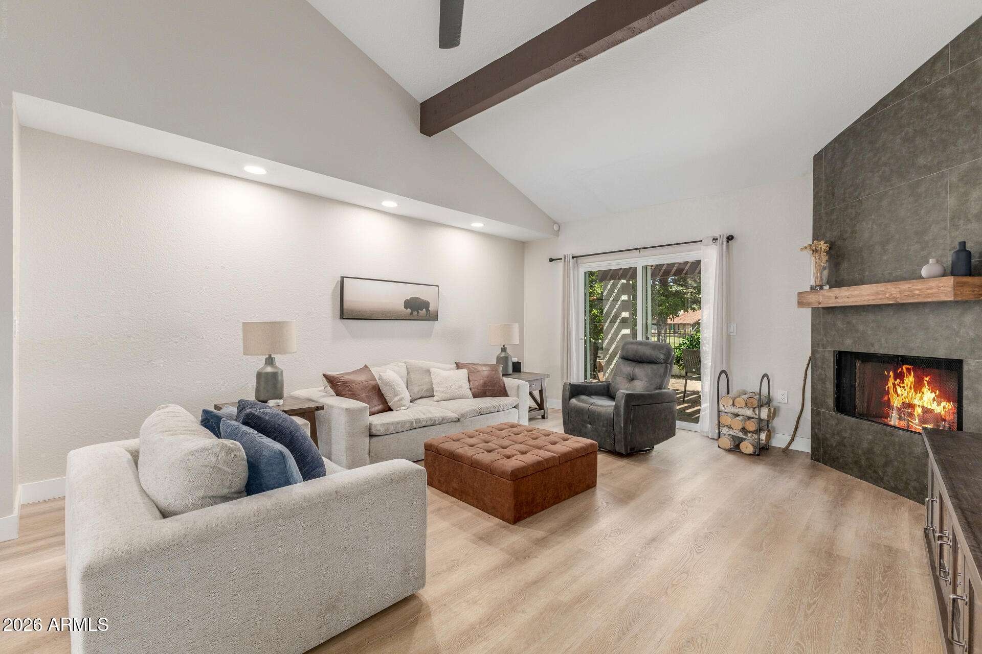 11629 North 40th Way Phoenix, AZ 85028 - Photo 10 of 47 a living room with furniture and a fireplace