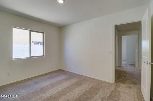 an empty room that has a window