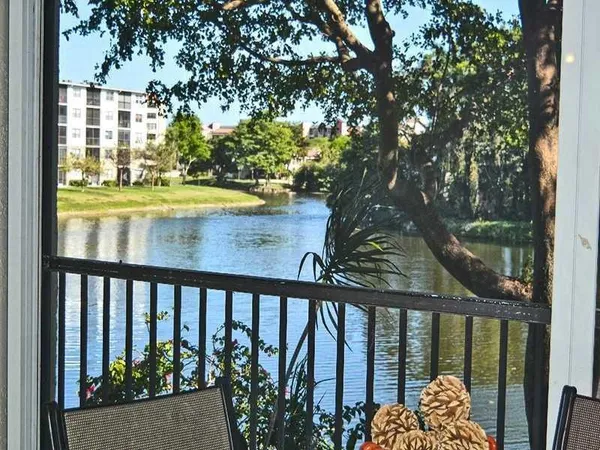 a view of a swimming pool from a balcony