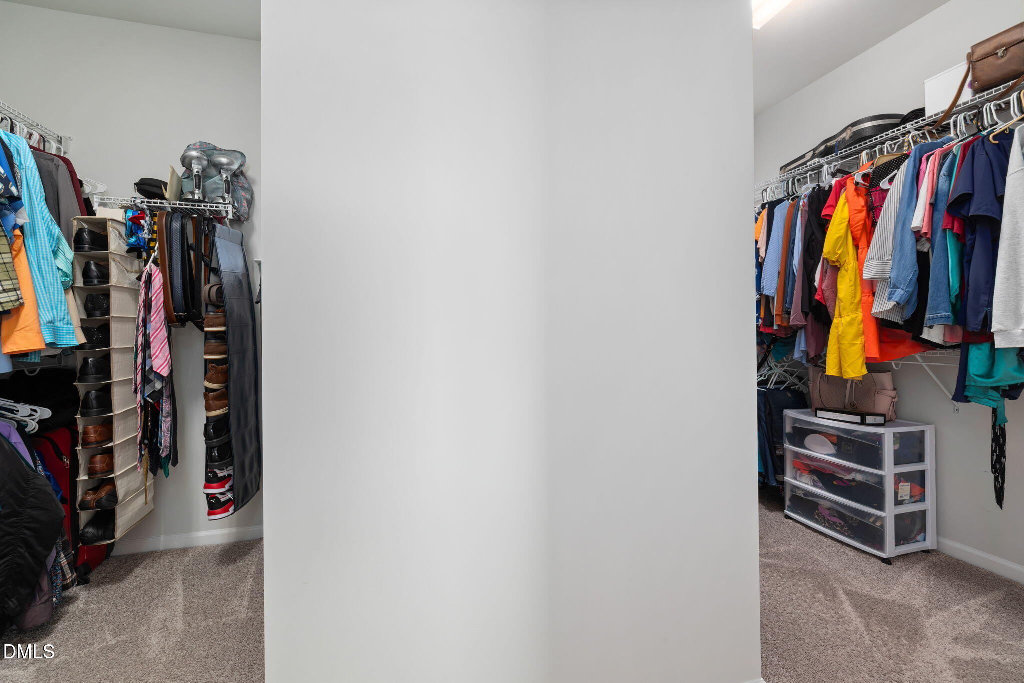 3422 Longleaf Estates Drive Raleigh, NC 27616 - Photo 44 of 71 a view of walk in closet with clothes