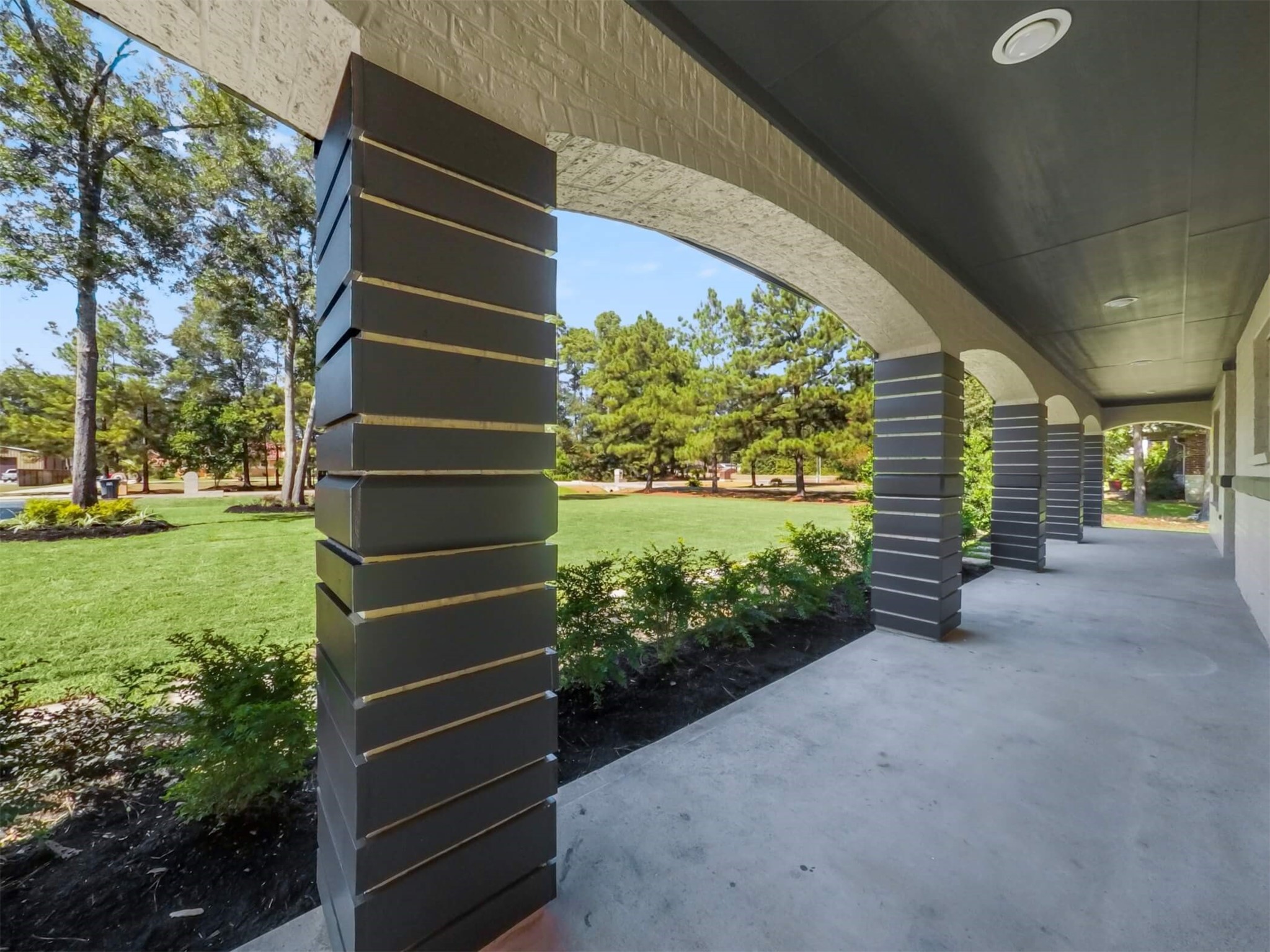 19502 Balsas Drive Porter, TX 77365 - Photo 4 of 44 The wide front patio has all the charm of a small-town porch with room for a full outdoor setup—think rocking chairs, hanging plants, and evening chats with neighbors.