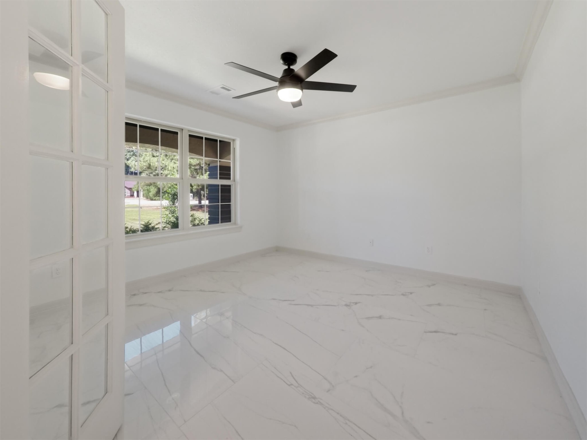 19502 Balsas Drive Porter, TX 77365 - Photo 7 of 44 This isn’t a corner of the bedroom—it’s a true office with doors, style, and enough room for dual monitors and a snack stash.