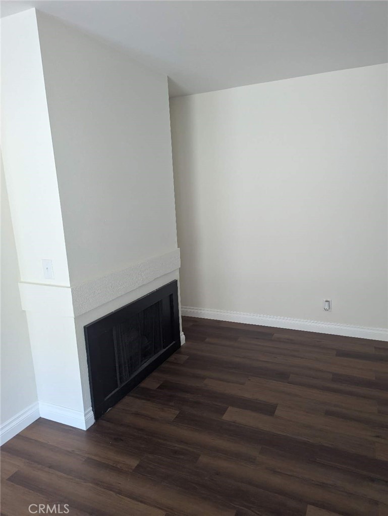64 Tangerine Irvine, CA 92618 - Photo 11 of 32 a view of an empty room with wooden floor and a window