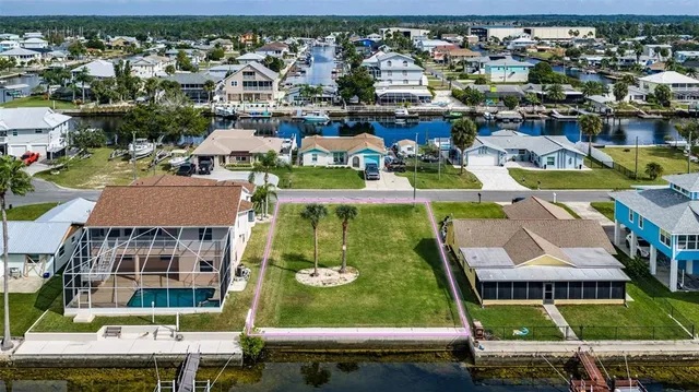 an aerial view of a house with a garden