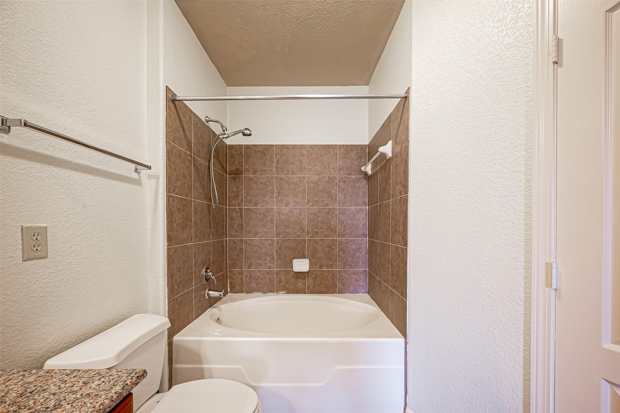 1711 Old Spanish Trail, Unit 303 Houston, TX 77054 - Photo 29 of 37 a bathroom with a shower and toilet