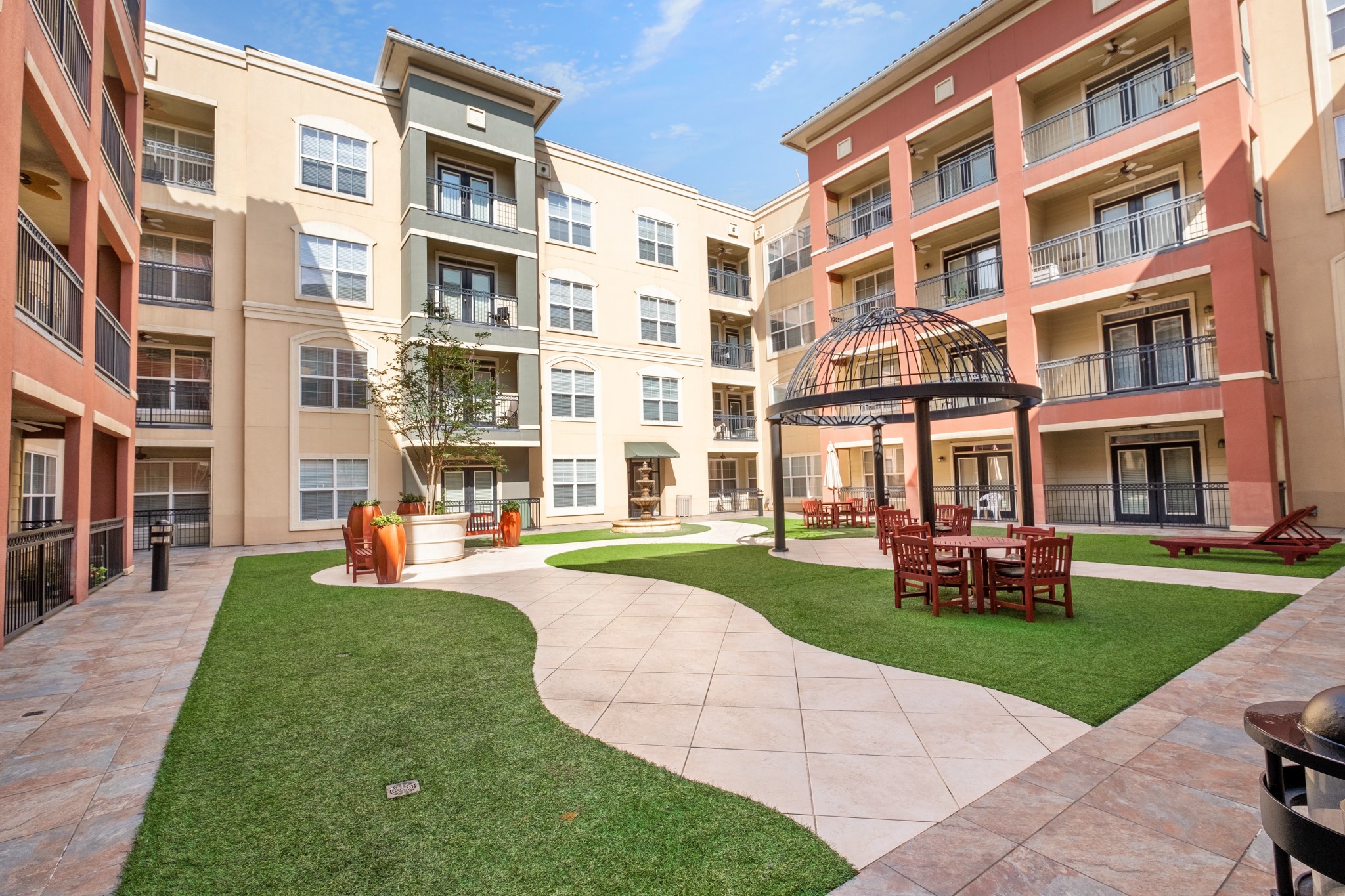 1711 Old Spanish Trail, Unit 303 Houston, TX 77054 - Photo 36 of 37 front view of a building with a garden