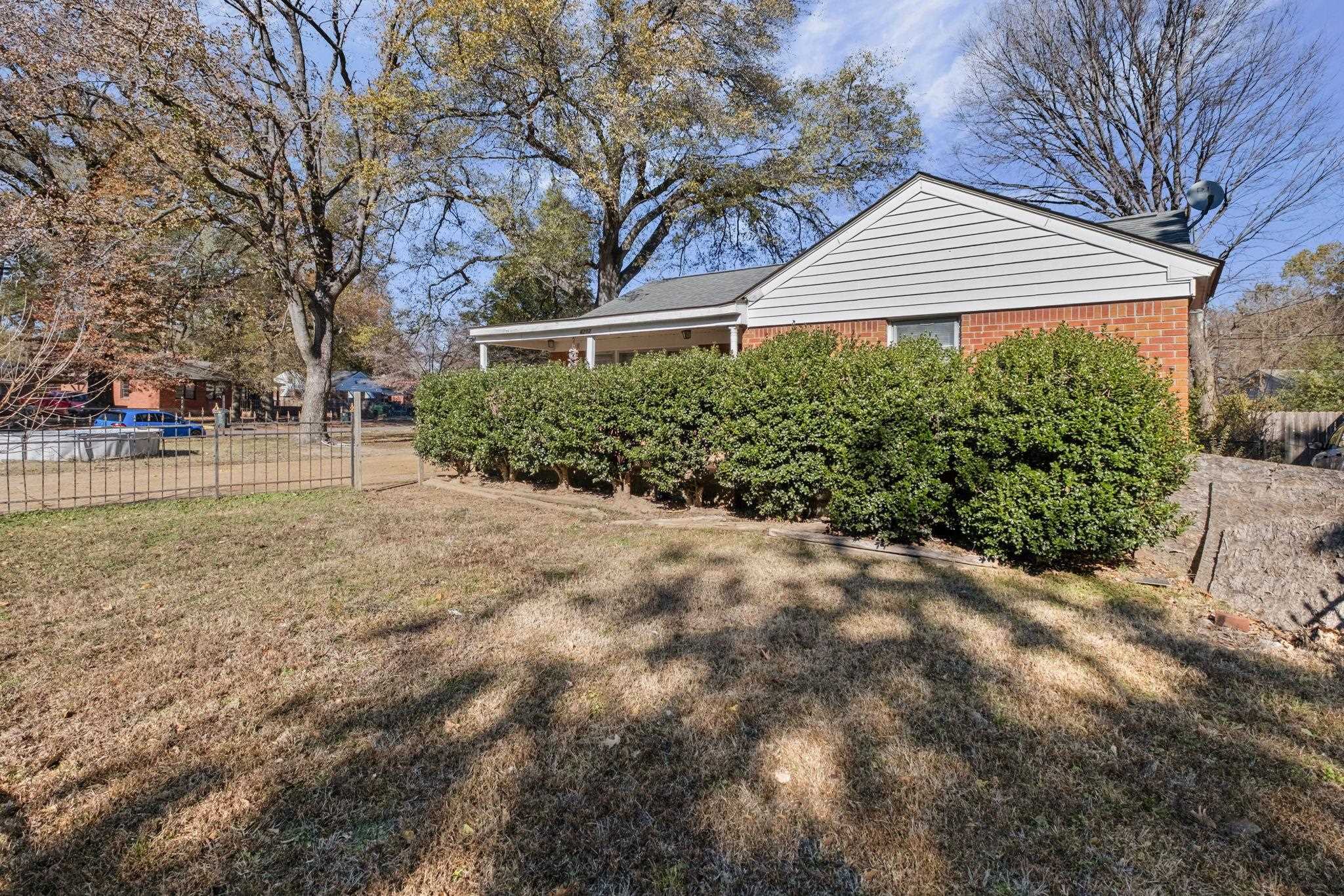 4202 Reed Avenue Memphis, TN 38108 - Photo 2 of 22 View of side of home featuring brick siding