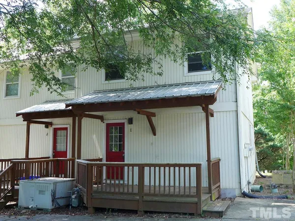 a view of a house with a deck