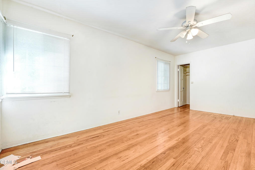 4824 Toland Way Los Angeles, CA 90041 - Photo 9 of 26 a view of an empty room with wooden floor