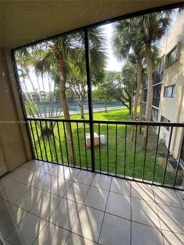 a view of a street view from a balcony