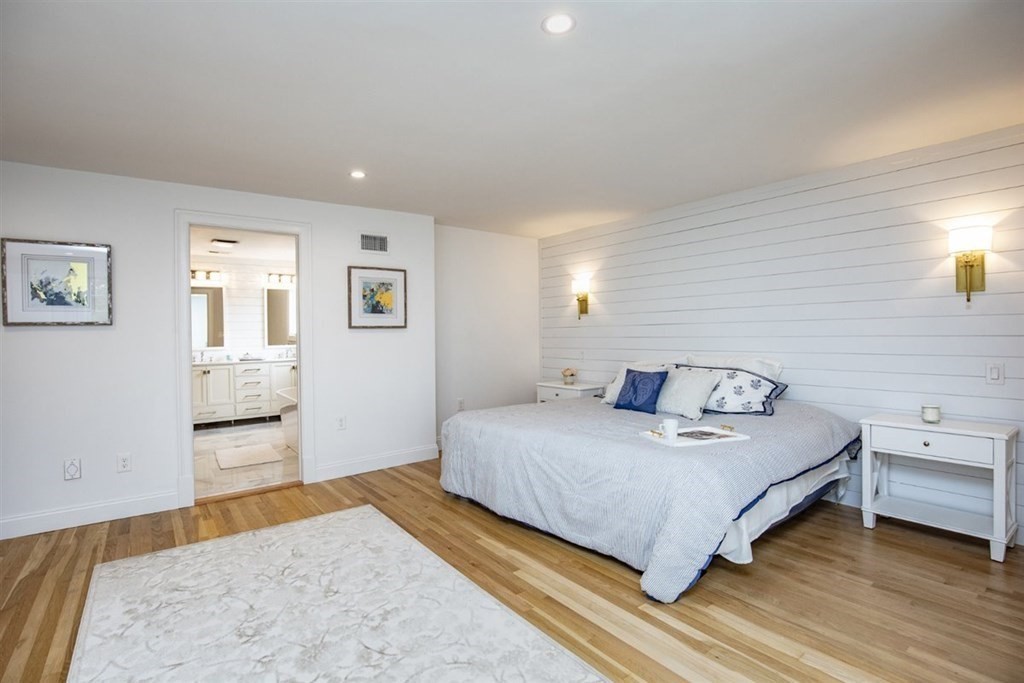 6 Rolleston Road Marblehead, MA 01945 - Photo 12 of 26 a bedroom with a bed and a couch