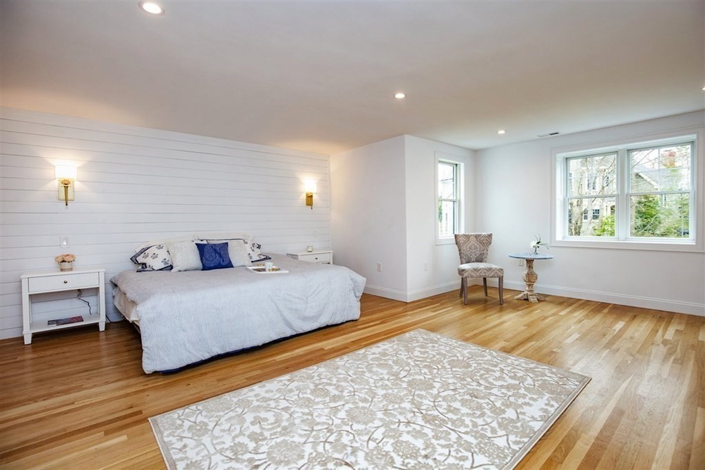 6 Rolleston Road Marblehead, MA 01945 - Photo 13 of 26 a spacious bedroom with a bed and wooden floor