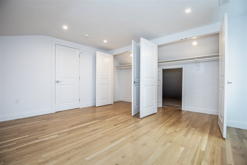 6 Rolleston Road Marblehead, MA 01945 - Photo 17 of 26 a view of an empty room with wooden floor and closet