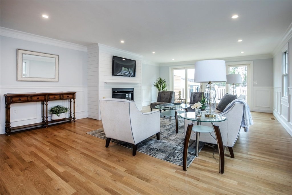 6 Rolleston Road Marblehead, MA 01945 - Photo 6 of 26 a living room with furniture a fireplace and a flat screen tv