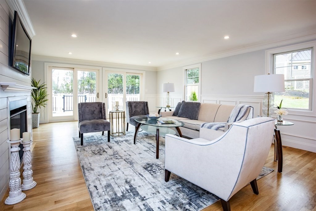 6 Rolleston Road Marblehead, MA 01945 - Photo 7 of 26 a living room with furniture a large window and a flat screen tv