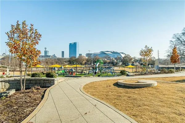 a view of a swimming pool and an outdoor space