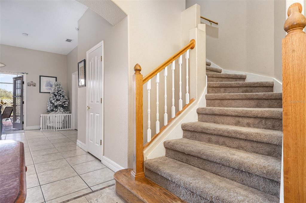 302 Vista Loop Davenport, FL 33897 - Photo 2 of 22 a view of entryway and hall with wooden floor
