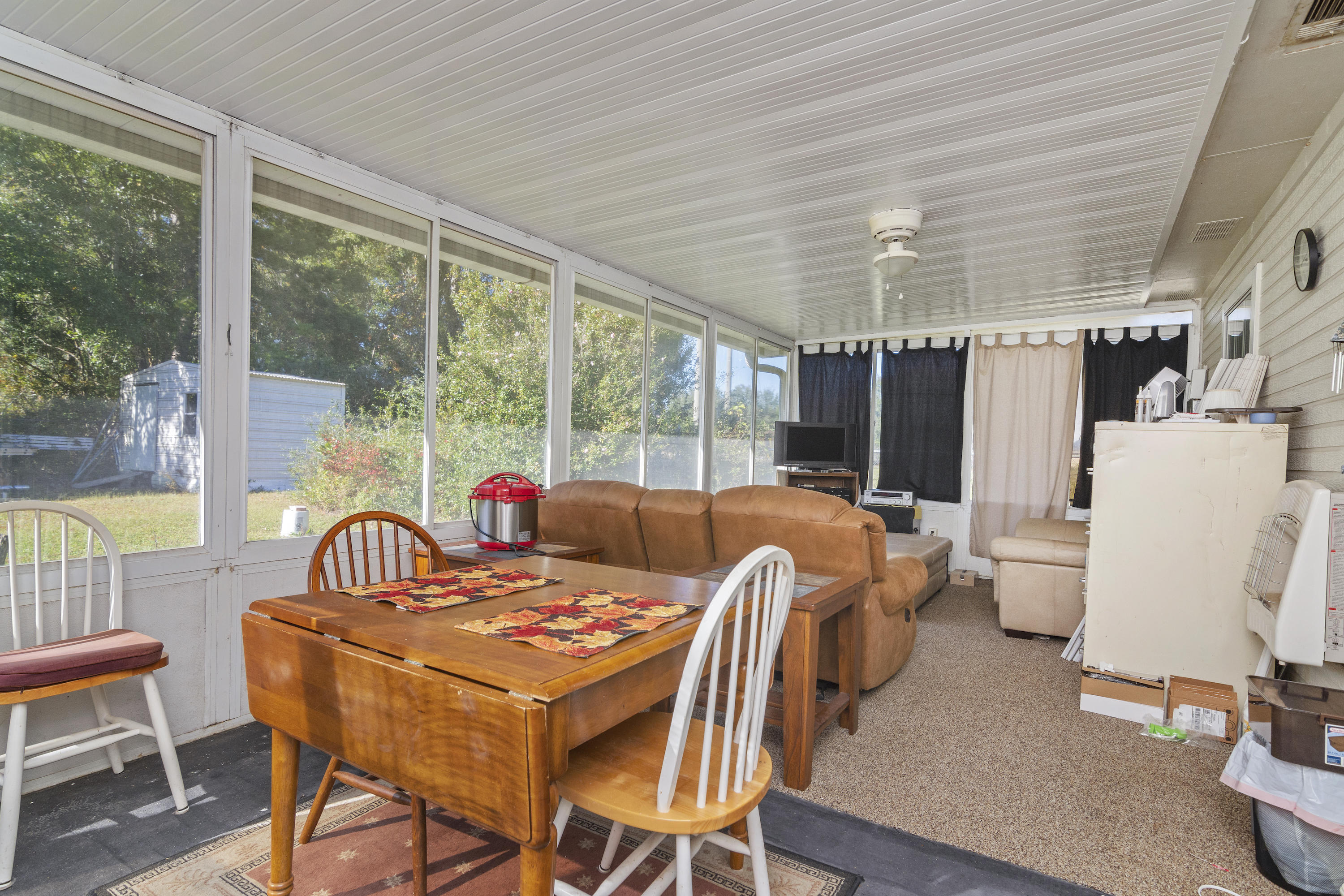 216 Brookmeade Drive Crestview, FL 32539 - Photo 20 of 29 a view of a dining room with furniture window and outside view