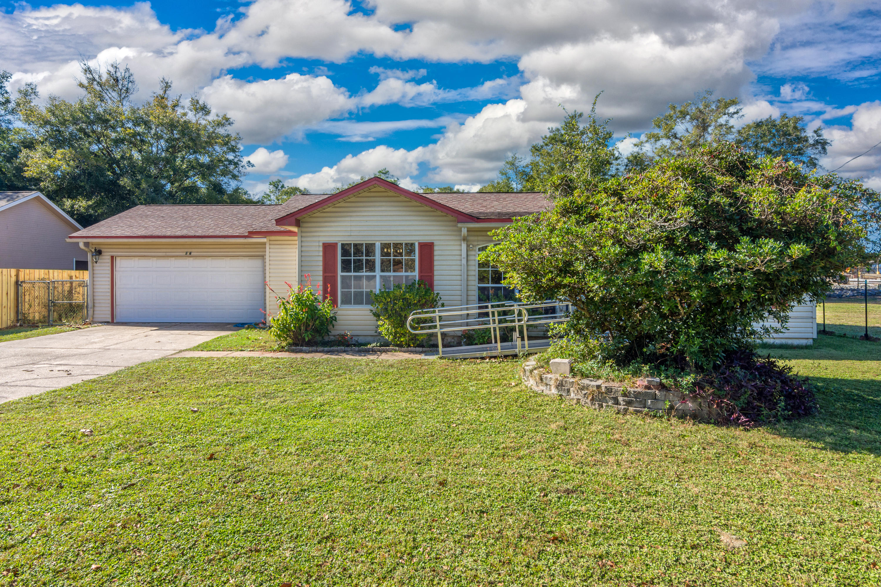 216 Brookmeade Drive Crestview, FL 32539 - Photo 2 of 29 a house view with a garden space