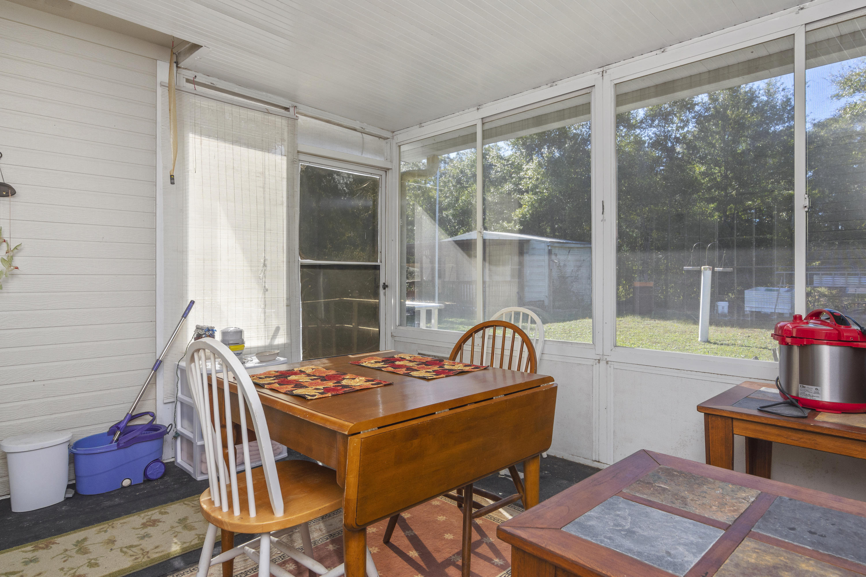 216 Brookmeade Drive Crestview, FL 32539 - Photo 22 of 29 a outdoor dining space with furniture and garden view