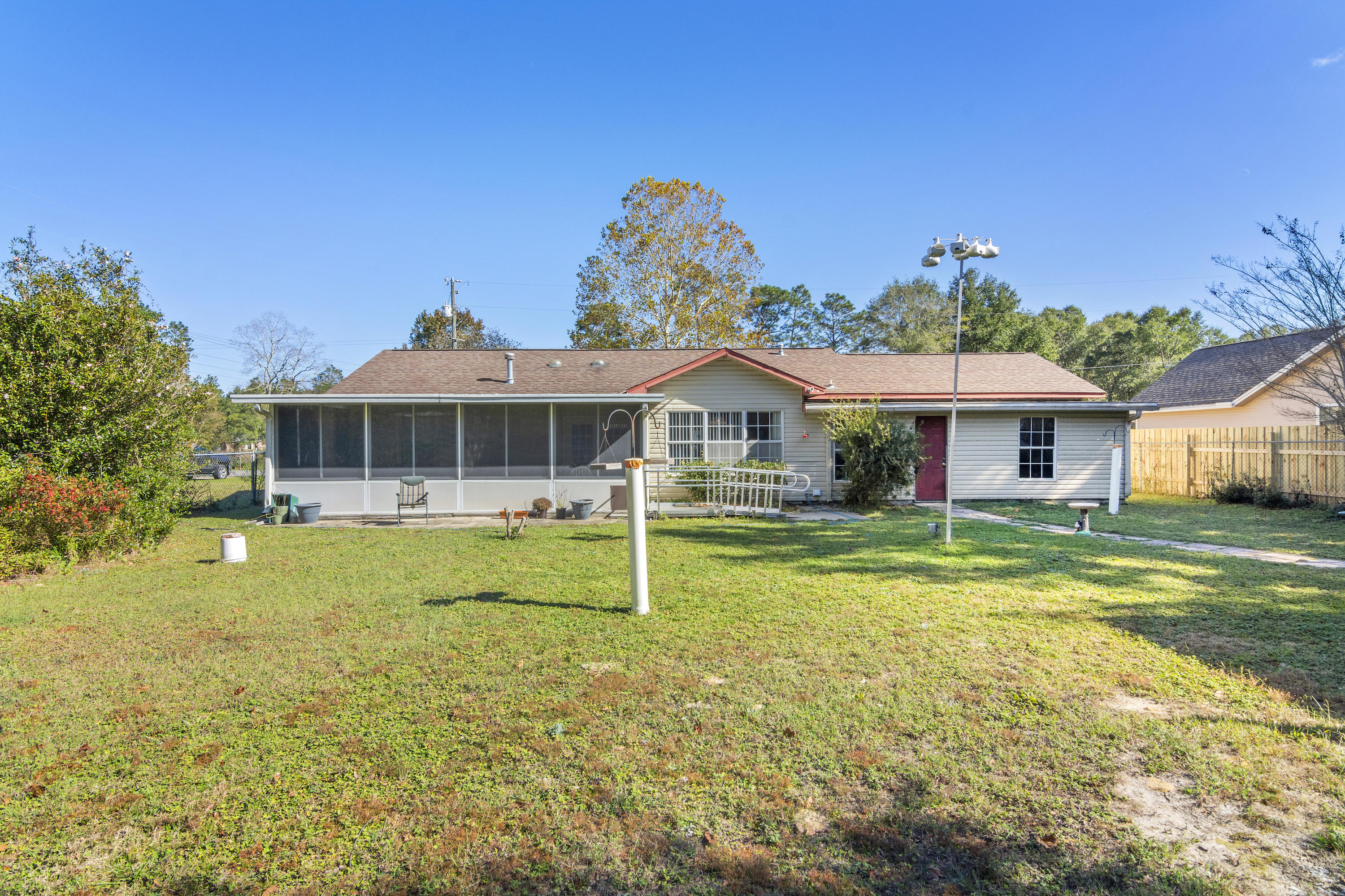 216 Brookmeade Drive Crestview, FL 32539 - Photo 25 of 29 a front view of a house with a yard