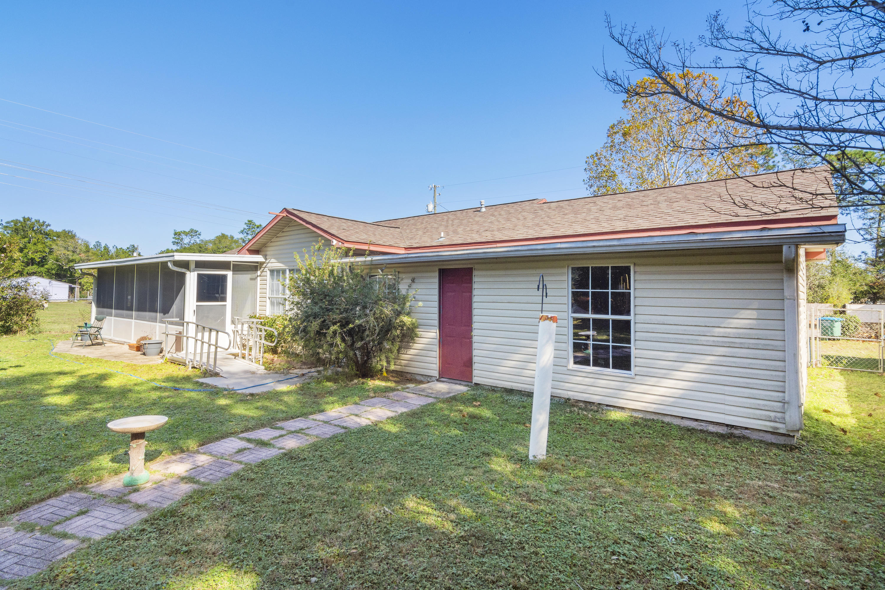 216 Brookmeade Drive Crestview, FL 32539 - Photo 26 of 29 a view of a house with a yard
