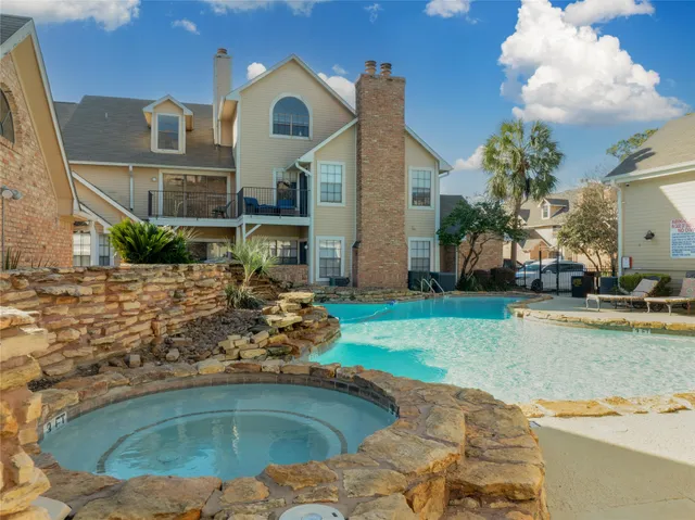 a view of a house with a swimming pool