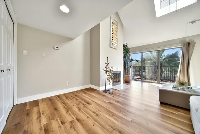 a view of an empty room and window