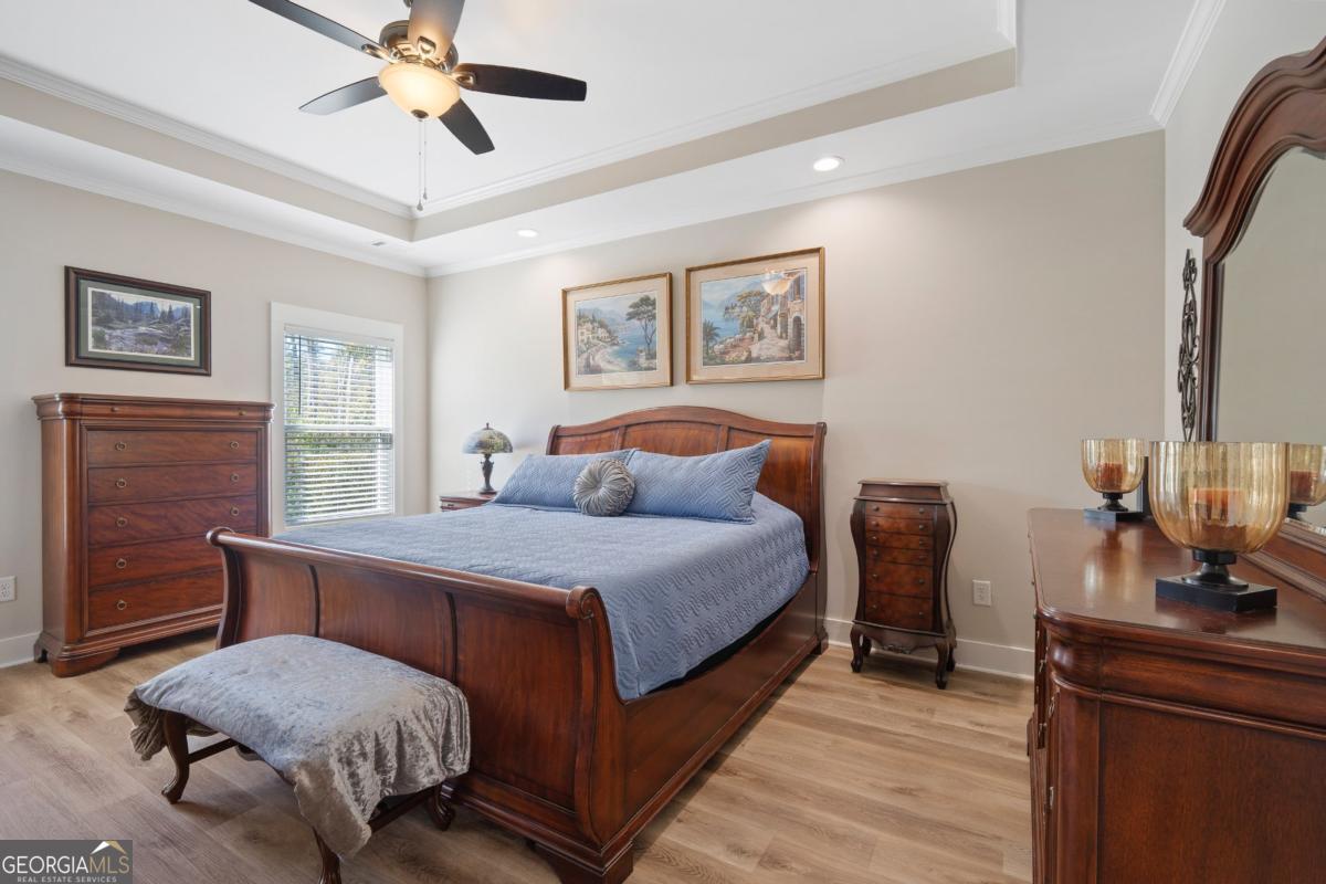 801 Holly Ridge Drive Gray, GA 31032 - Photo 26 of 51 a living room with a bed furniture and a window