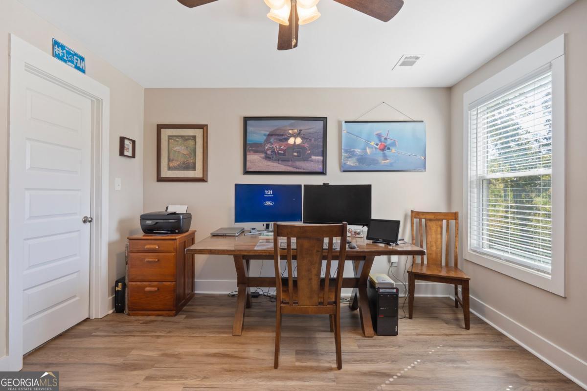 801 Holly Ridge Drive Gray, GA 31032 - Photo 42 of 51 a view of a workspace with furniture and a window