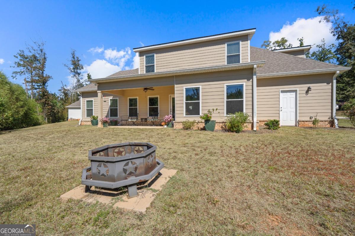 801 Holly Ridge Drive Gray, GA 31032 - Photo 49 of 51 a front view of a house with a yard