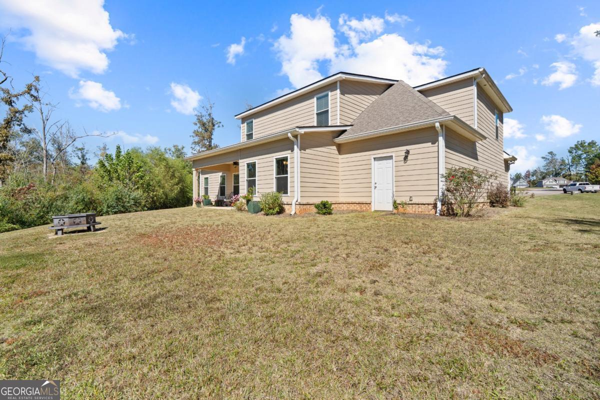 801 Holly Ridge Drive Gray, GA 31032 - Photo 50 of 51 a front view of a house with a yard