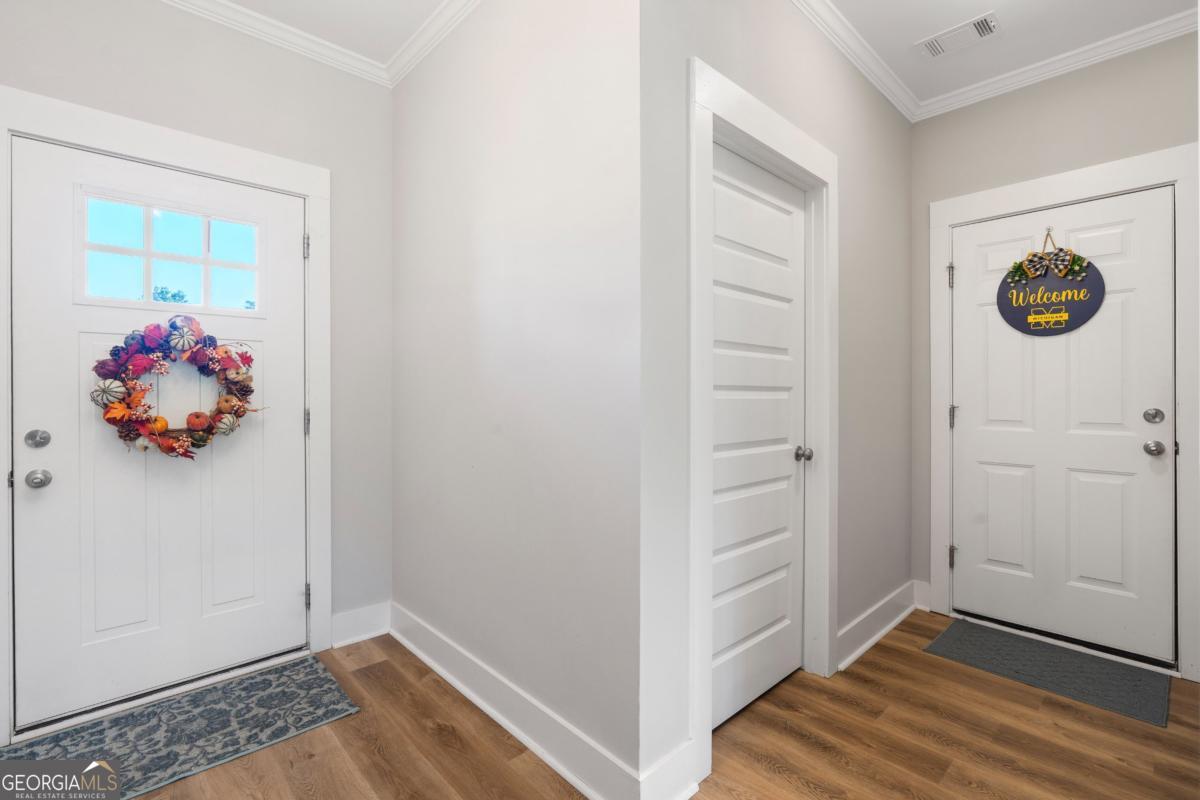 801 Holly Ridge Drive Gray, GA 31032 - Photo 5 of 51 a view of a room that has a bench and closet